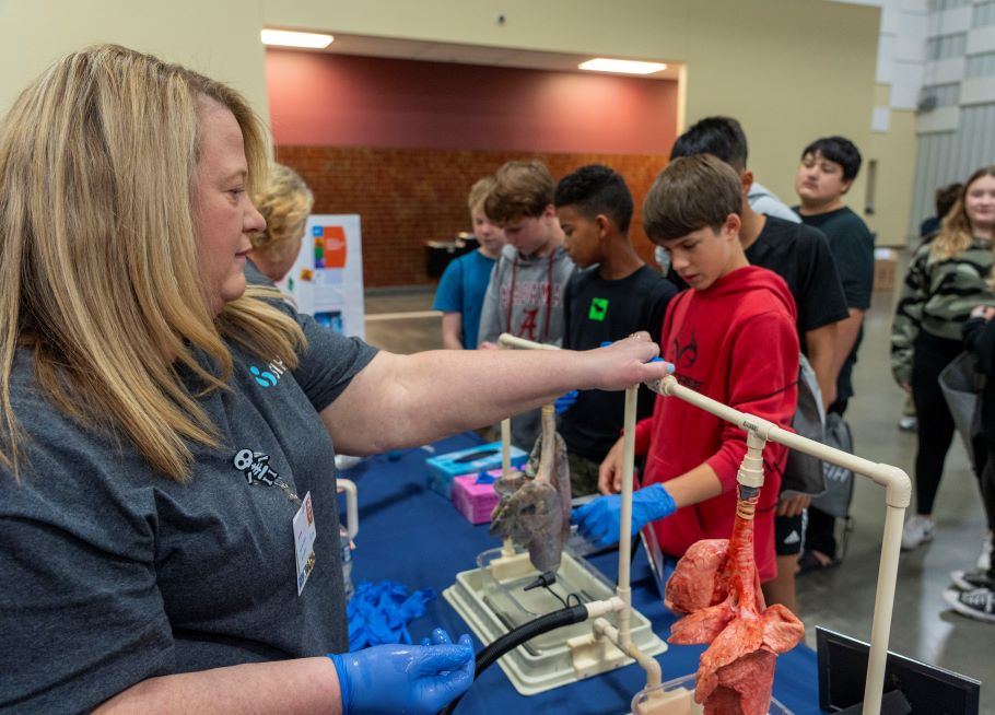 Showcasing healthy and damaged lungs during a 2024 career expo